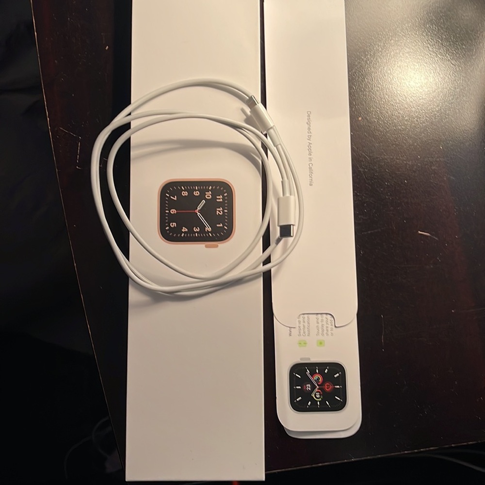 New Rose Gold or Black Apple Watch 40 mm.  Both for Sale at $250 each.